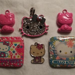 4 HELLO KITTY CHARMS & 2 PINS